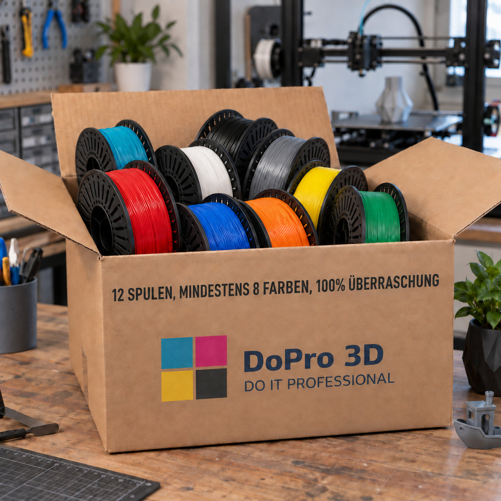 DoPro 3D PETG Mystery Box – geöffneter Karton voller Filamentspulen in der Werkstatt